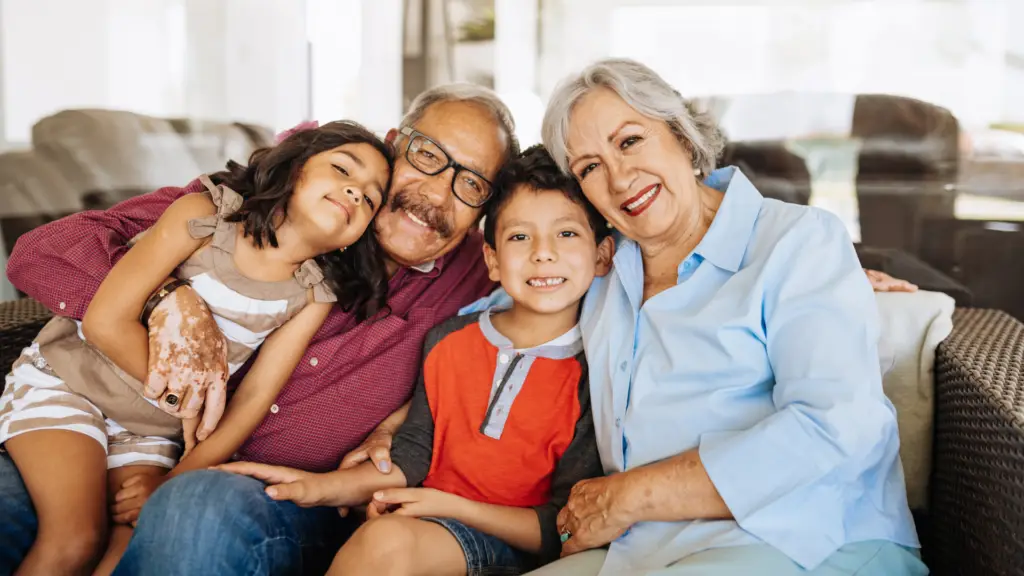 grandparents cuddling with grandchildren
