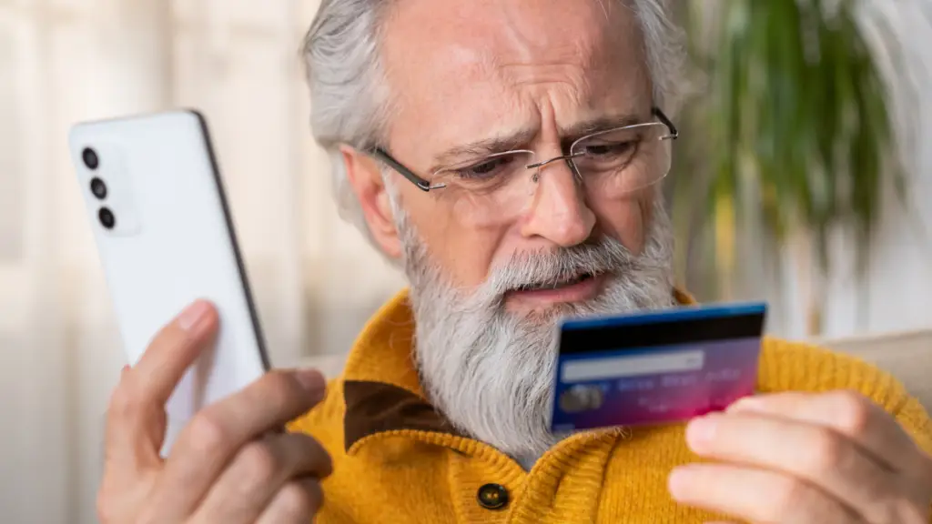 medicare beneficiary on the phone with his credit card company