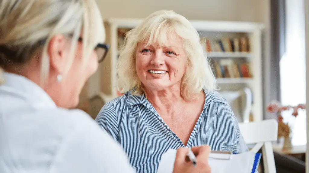 doctor writing a prescription for medicare patient