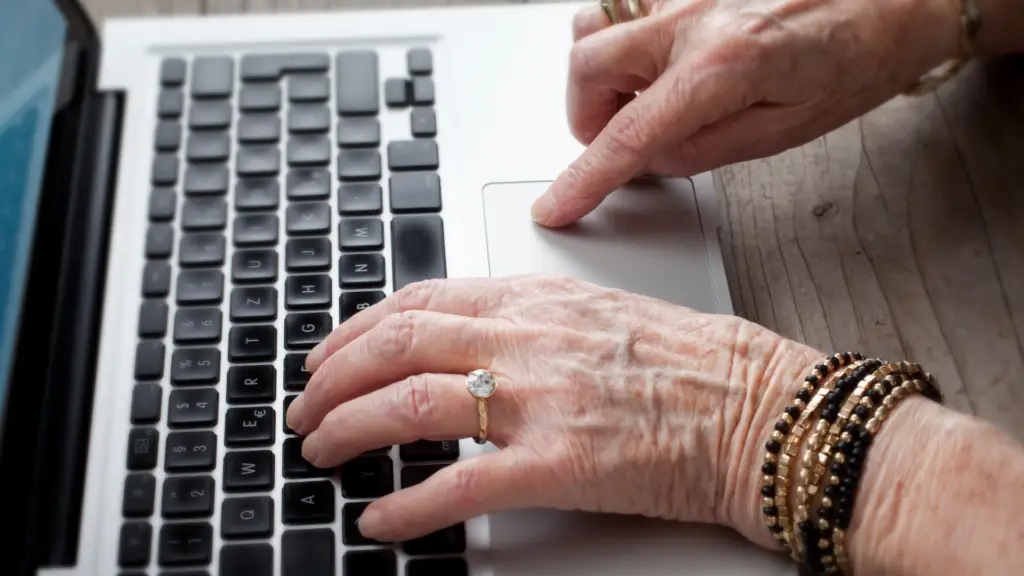 elderly woman using laptop