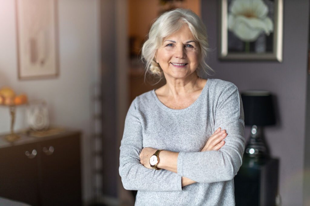 Smiling senior woman in her home