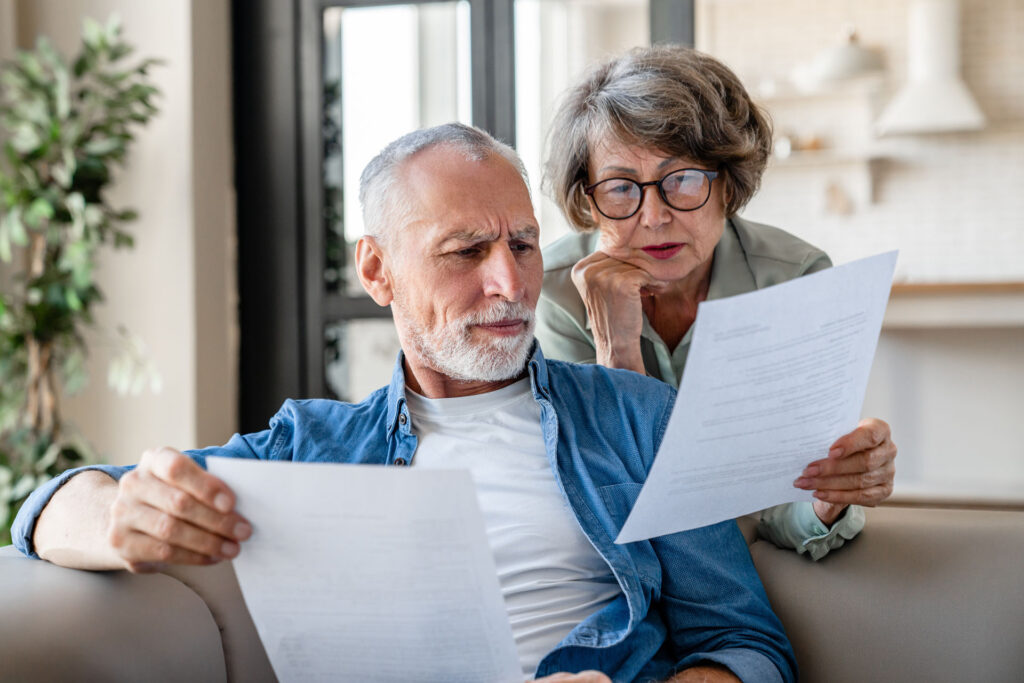 Senior couple reviewing Medicare coverage
